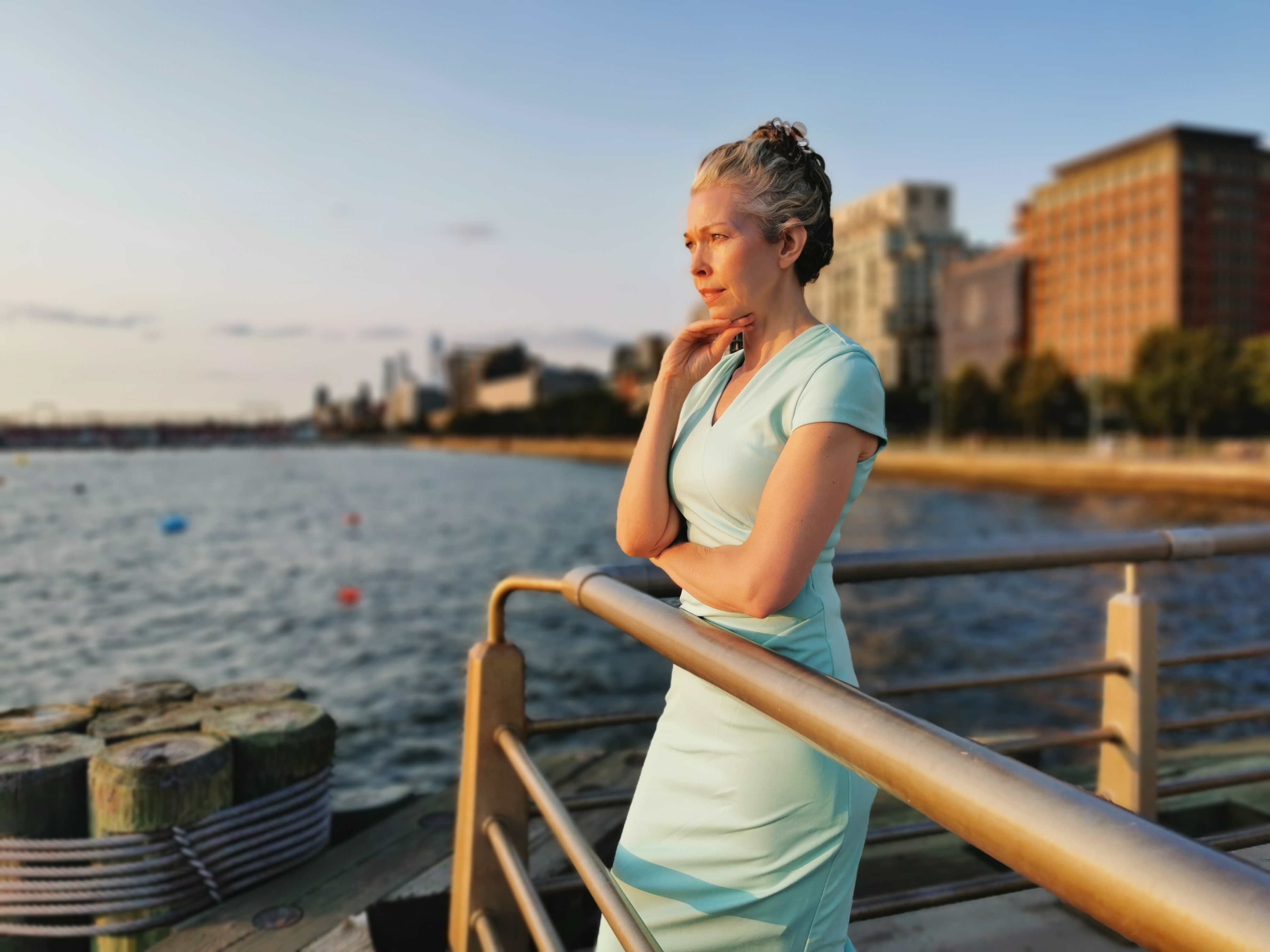 Julie Pullen standing by the water at a pier