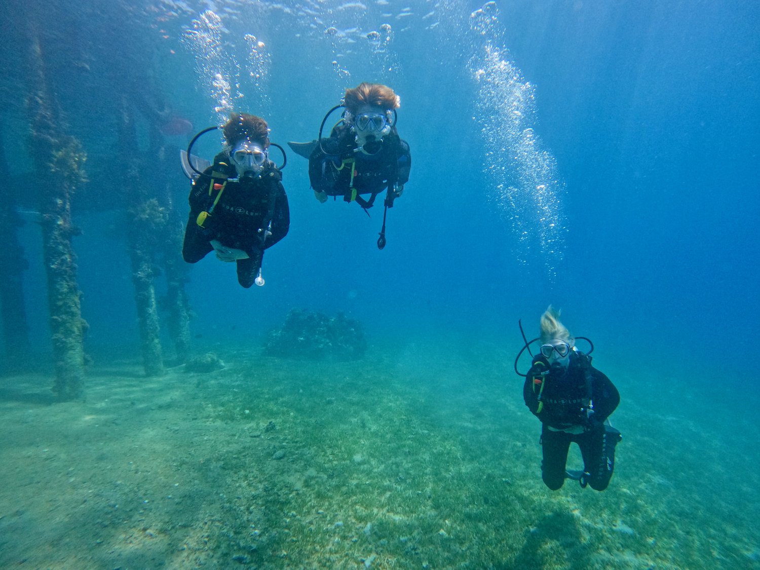 Julie Pullen and her sons scuba diving