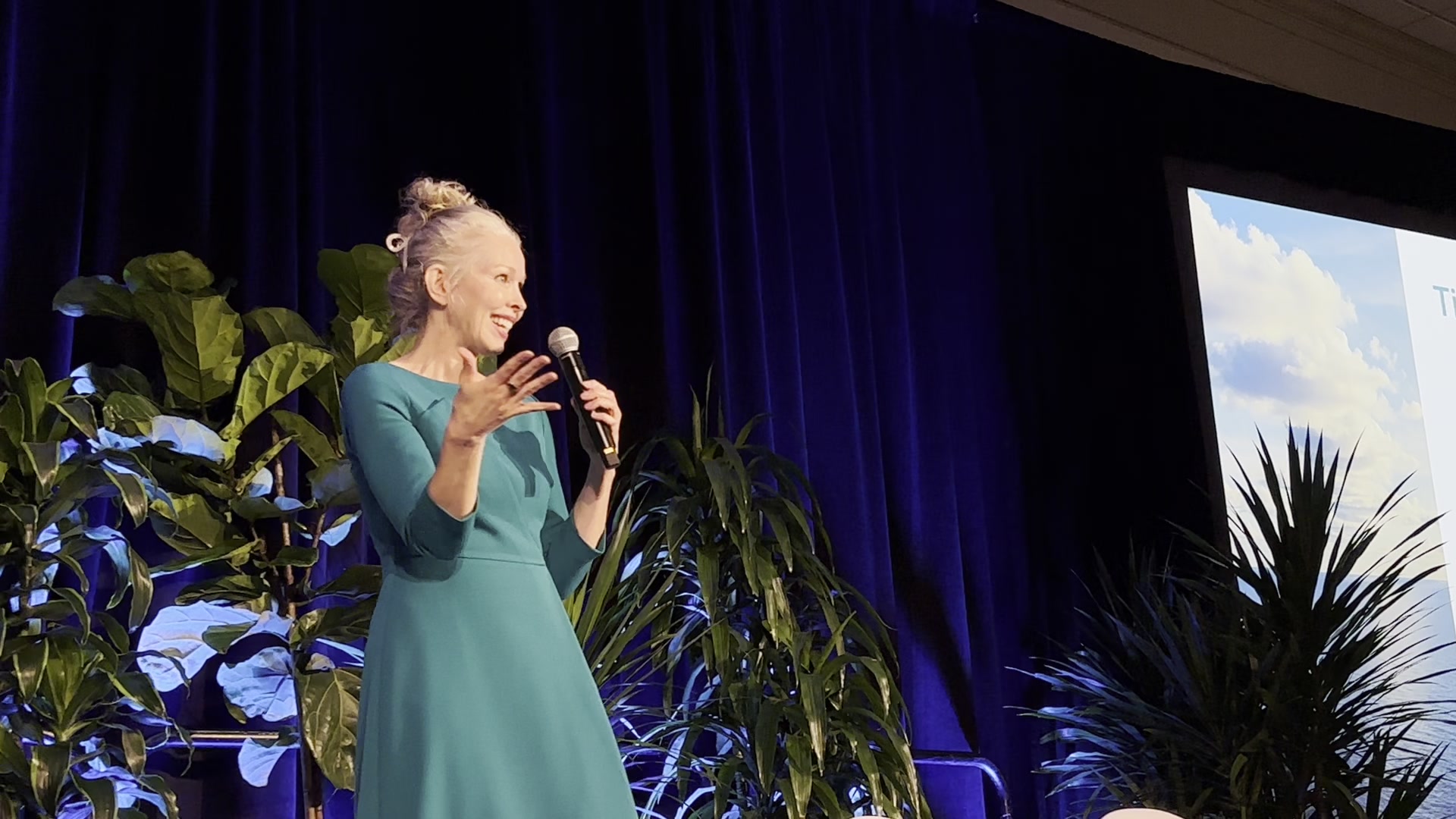 Dr. Julie Pullen speaking on stage at EarthX Summit 2025.